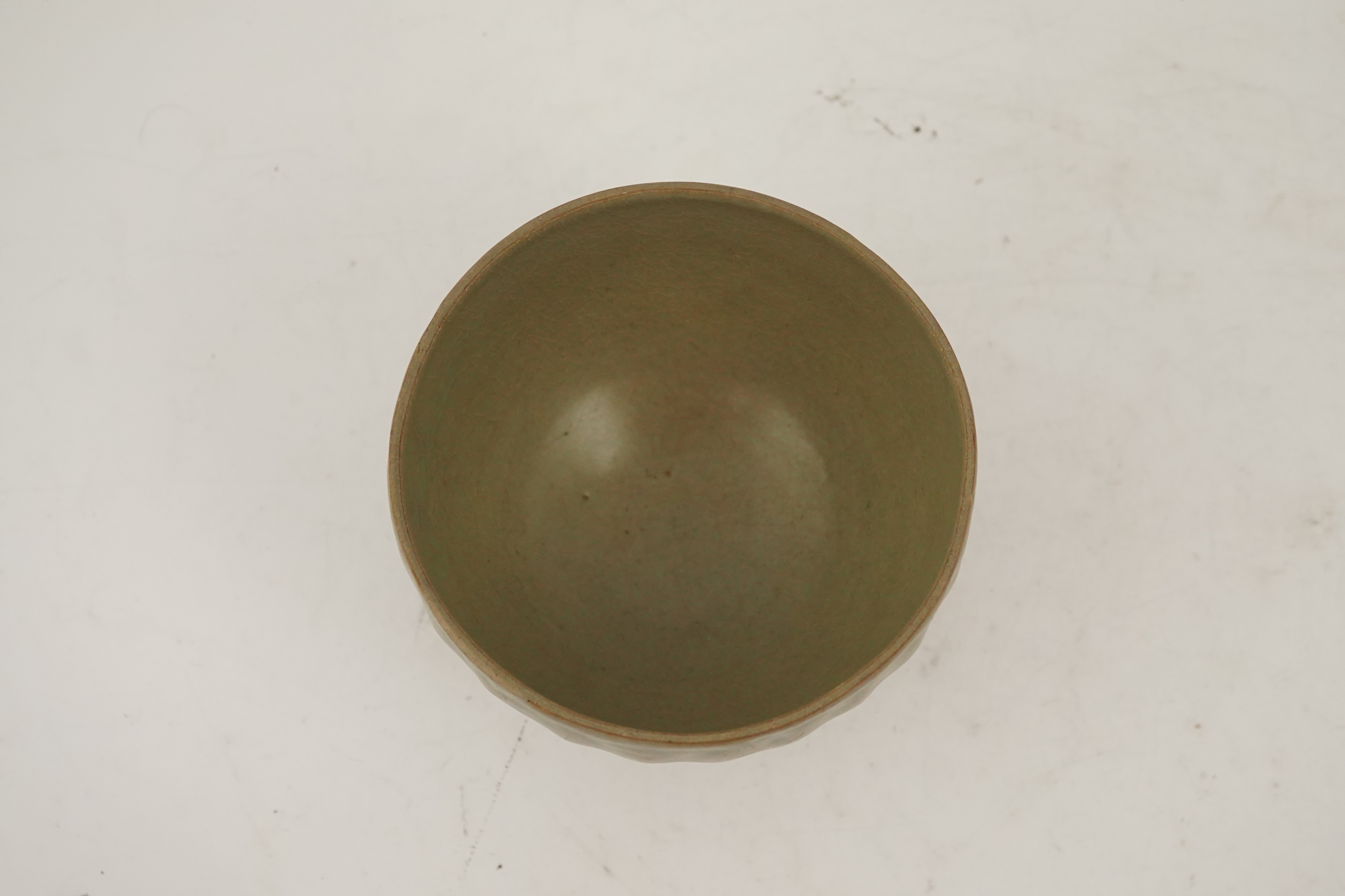 A Chinese Longquan celadon petal lobed deep bowl, Southern Song/Yuan dynasty, 13th century